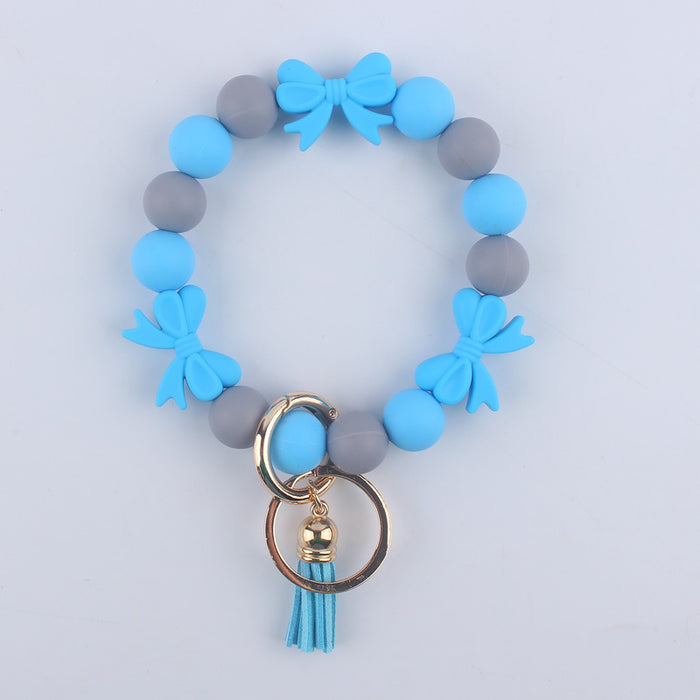 Wholesale PU Cartoon Bowknot Silicone Handmade Beaded Wrist Keychain JDC-KC-GuangTian006