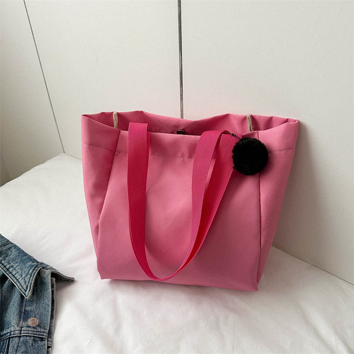 Wholesale Solid color large capacity canvas shoulder bag, simple commuting tote bag, shopping bag
