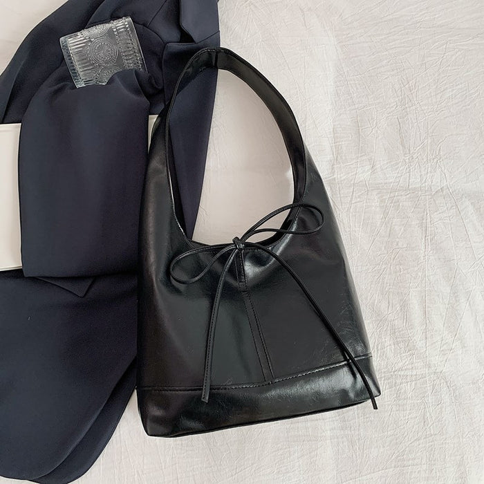 Wholesale Small commuting bag, versatile leisure bag, bow tie, large capacity single shoulder underarm tote bag