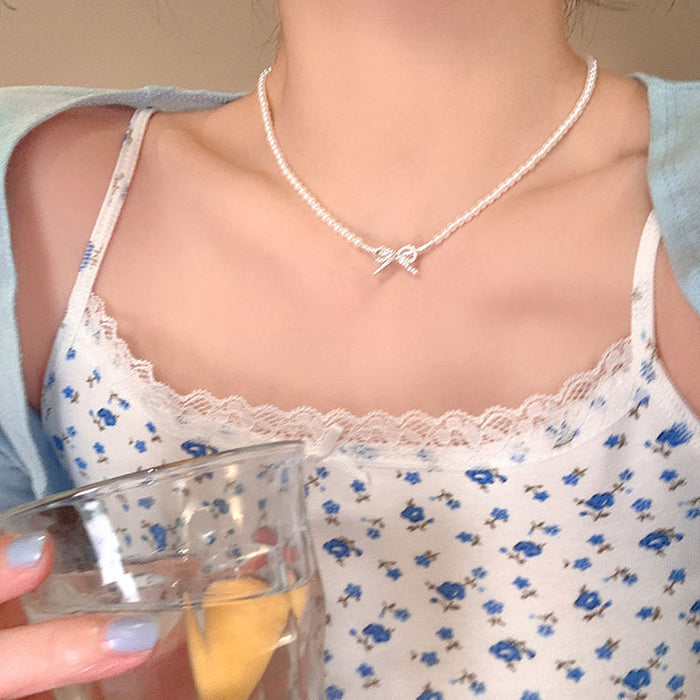 Wholesale Butterfly knot pearl necklace, simple and niche fashion, light luxury, versatile collarbone chain accessories