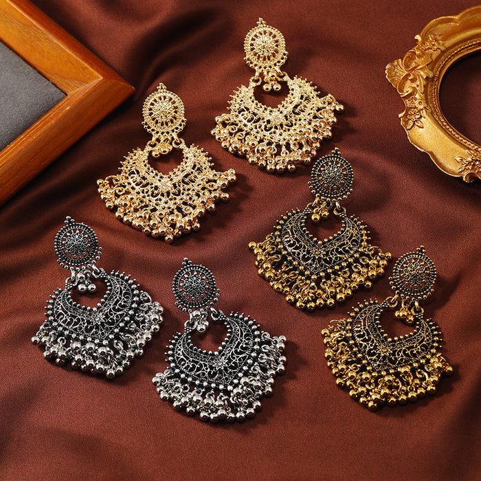 Wholesale Retro Bohemian ethnic style earrings for women exaggerated temperament hollow heart earrings long bell India