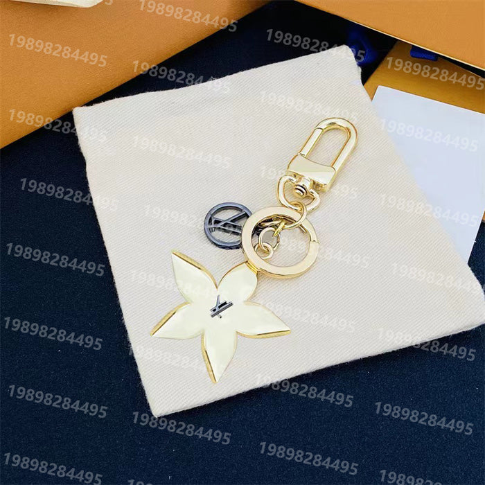 Wholesale Sunflower Letter Alloy Bag Pendant Keychain JDC-KC-LaoHuapi003