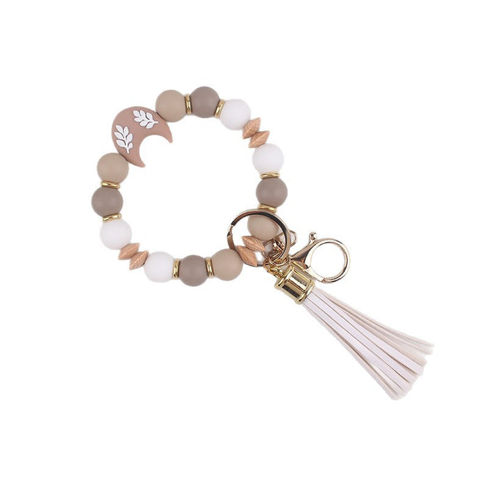 Wholesale Silicone moon beads bag key bracelet bracelet silicone beads beech wood beads tassel keychain