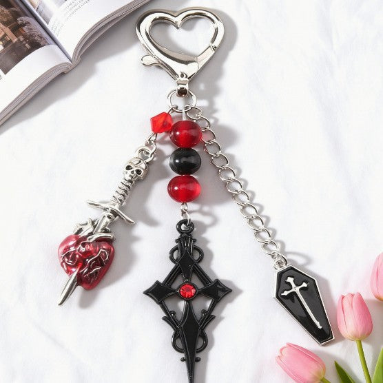 Wholesale Y2K Dark Style Cross Raccoon Butterfly Arrow Through Heart Keychain Pendant Zinc Alloy Boutique Resale Accessory