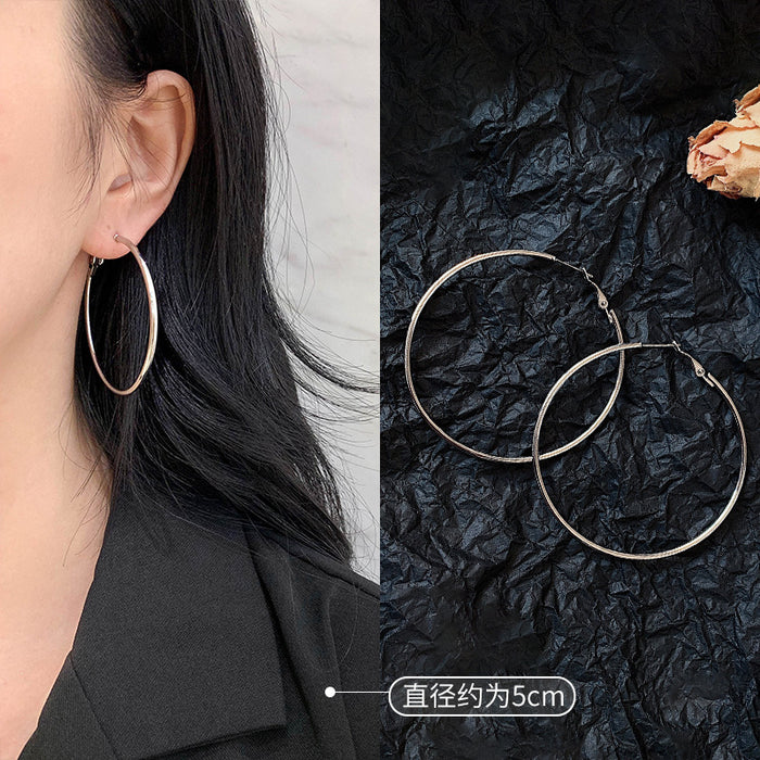 Wholesale Pure silver earrings with large circles, plain circles, and high-end feel. Round circle earrings
