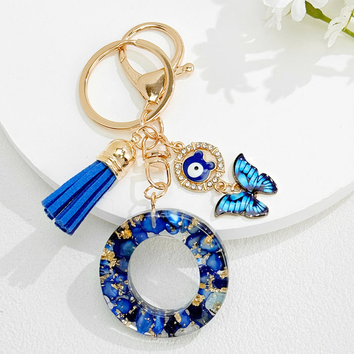 Wholesale Royal Blue 26 Letter Keychain with Evil Eye Butterfly Tassel Pendant