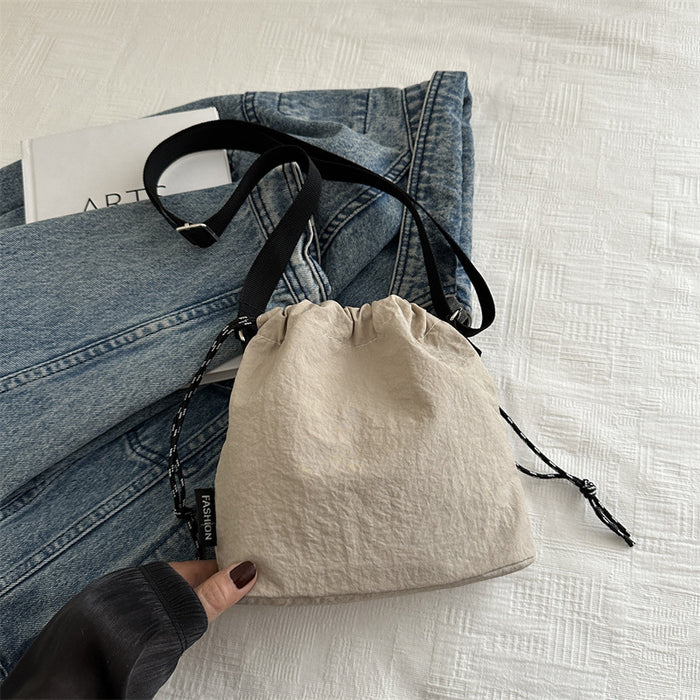 Wholesale Lightweight sports shoulder crossbody bag, casual large capacity, fashionable pleated bucket bag