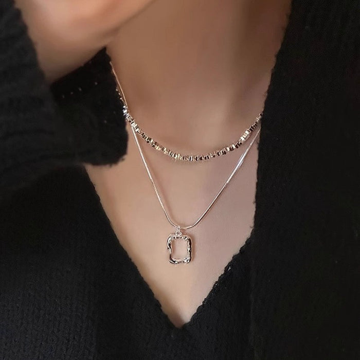 Wholesale Double layered necklace with light luxury and niche hollow block design, exquisite silver plated collarbone chain