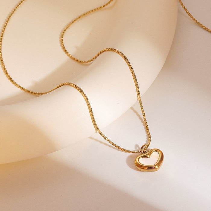 Wholesale Stainless Steel Clavicle Chain Necklace — Asymmetrical Design featuring a Bowknot  Rhinestone Accents  and Heart Pendant