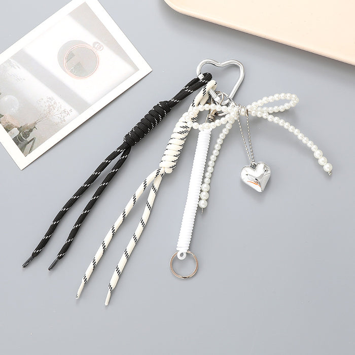 Wholesale Leather bow heart pendant luggage keychain lanyard accessories single buckle tassel pendant accessories
