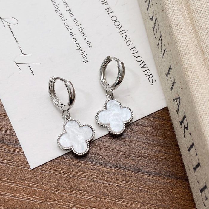 Wholesale Simple lucky flower gold plated earrings