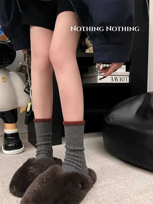 Wholesale Versatile autumn and winter contrasting thick wool socks for warmth, simplicity, and artistic style, with a long tube and stacked socks