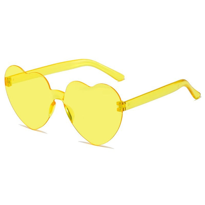 Wholesale Love sunglasses party one-piece frameless sunglasses transparent peach heart glasses