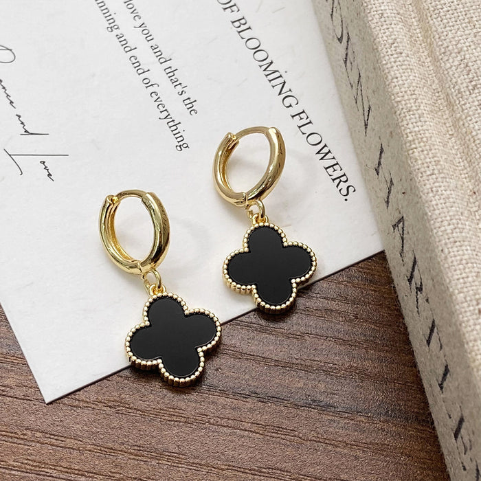 Wholesale Simple lucky flower gold plated earrings