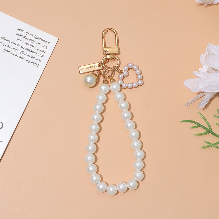 Wholesale Pearl Love Shell Keychain Beaded Hand Chain Key Ring Girl Heart Mobile Phone Bag