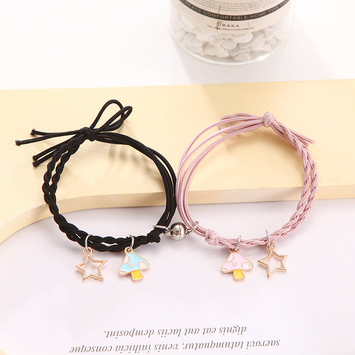 Wholesale Cartoon couple bracelets a pair of small rubber band magnets attract bell bracelet gift