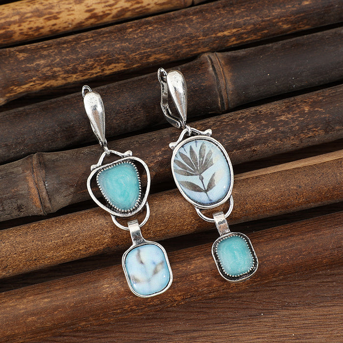 Wholesale Retro ethnic style asymmetrical geometric inlaid blue gemstone printed plant alloy earrings