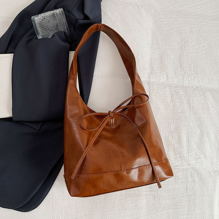 Wholesale Small commuting bag, versatile leisure bag, bow tie, large capacity single shoulder underarm tote bag