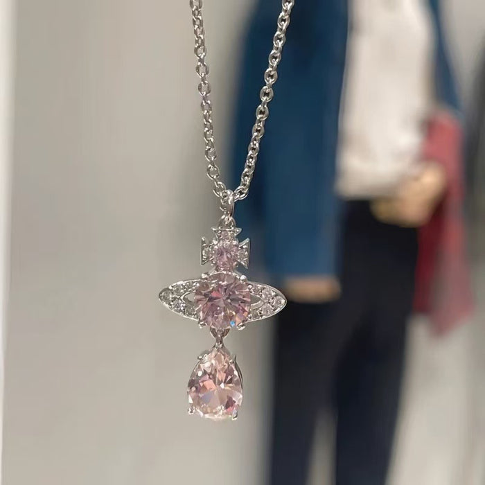 Wholesale pink bow mermaid tears three-dimensional planet necklace clavicle chain