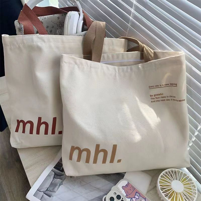 Wholesale New canvas bag, niche letter printed shoulder bag, large capacity commuting tote bag