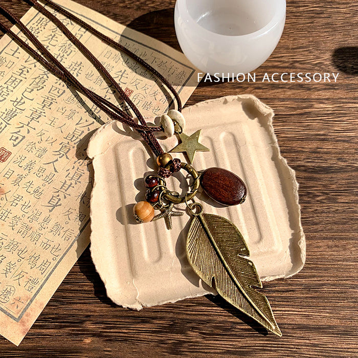 Wholesale Vintage feather necklace, double-layer layered long sweater chain accessory