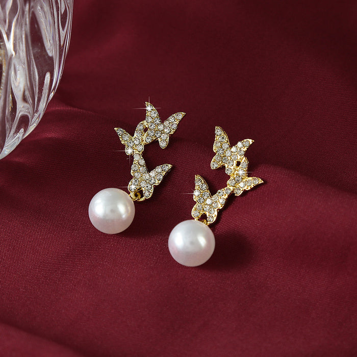 Wholesale New butterfly studded diamond earrings with temperament, long style, high-end feel, light luxury, fashionable and atmospheric pearl earrings