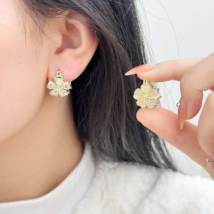 Wholesale Fashionable temperament, high-end earrings, light luxury, super fairy earrings, cat eye stones, double-sided flower ear buckles