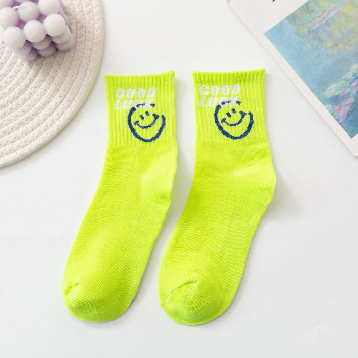 Wholesale of 10pcs Solid Color Knitted Smiling Face Mid Length Socks JDC-SK-Miqi007