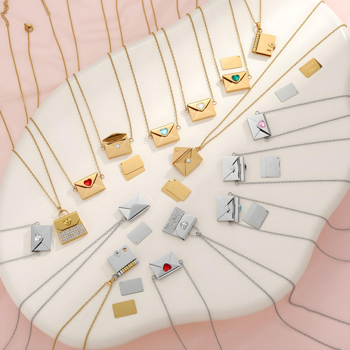 Wholesale Valentine' s Day-themed envelope-shaped stainless steel necklace with heart-shaped elements and rhinestones.