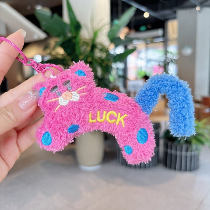 Wholesale Creative cartoon polka dot leopard doll keychain DIY twist tail decompression doll student pendant