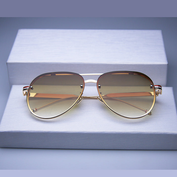 Wholesale High definition frameless sunglasses, trendy and fashionable sunglasses, UV resistant and strong light resistant glasses