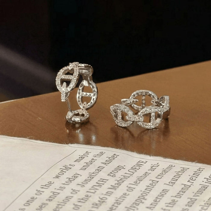 Wholesale Versatile Full-Diamond Sparkling Pig Nose Earrings with a High-End Feel,  Silver Needle Earrings,  Niche Design Zircon Crown Ear Studs