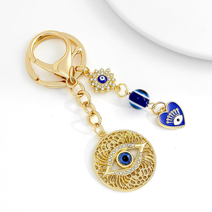 Wholesale Diamond-encrusted blue eyes evil eye tassel keychain