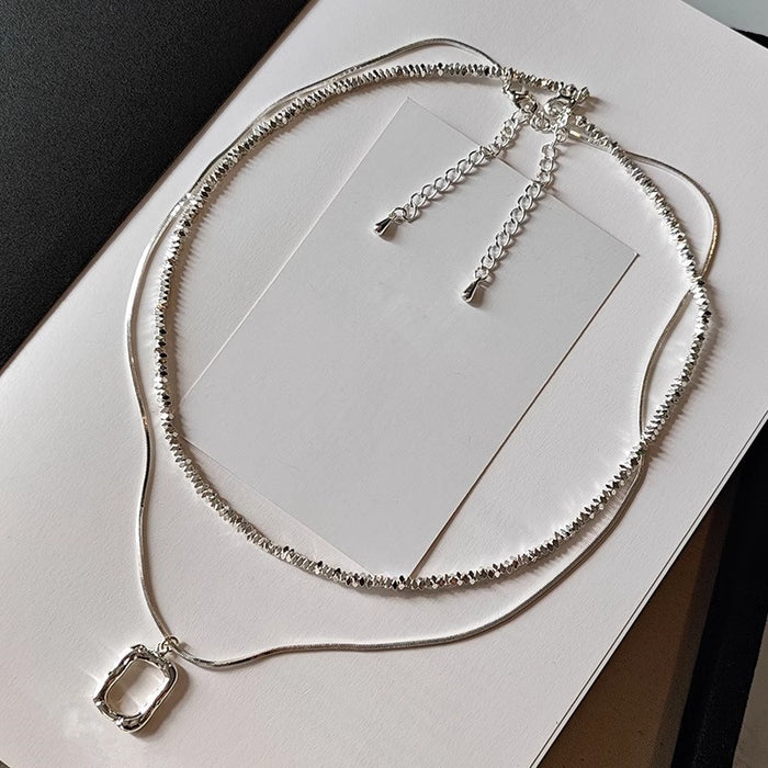 Wholesale Double layered necklace with light luxury and niche hollow block design, exquisite silver plated collarbone chain