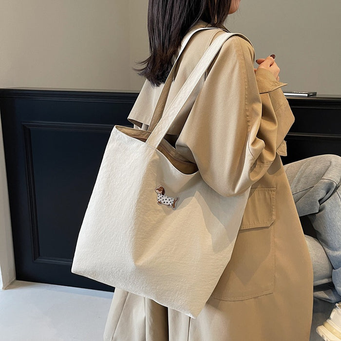 Wholesale Large capacity canvas bag, niche commuting handheld, high-end fashion shoulder bag
