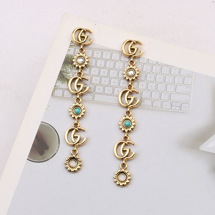 Wholesale double G Letter Elegant Versatile Tassel Earrings Daisy Accessible