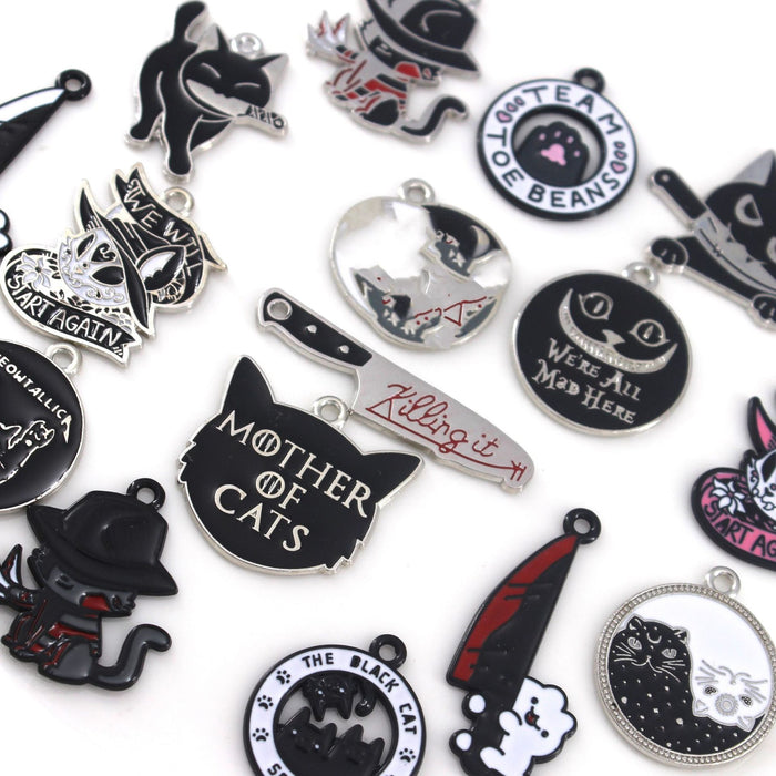 Wholesale 10pcs Cute Black Cat Dagger Alloy Oil Dropping Funny Jewelry Pendant Keychain Pendant Accessories