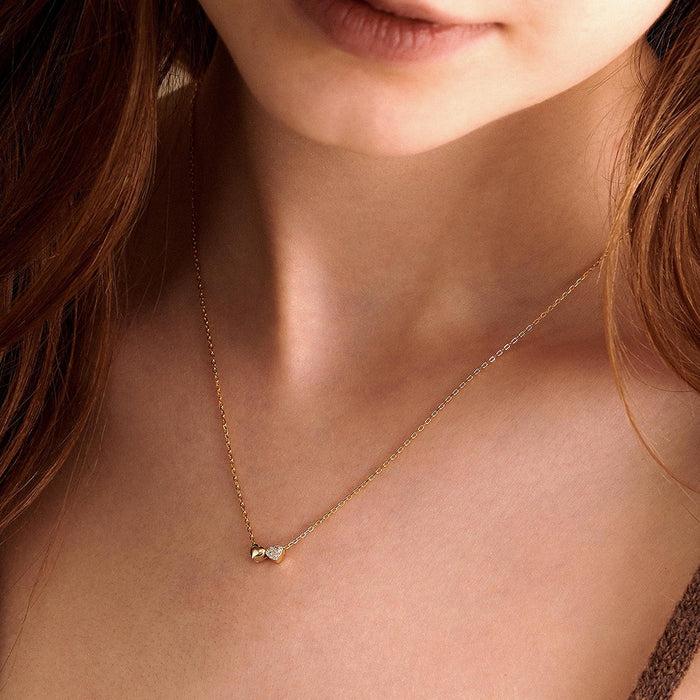 Wholesale European and American minimalist luxury mini heart-shaped collarbone chain temperament pendant copper plated gold necklace