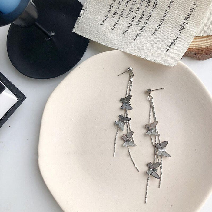 Wholesale Three dimensional butterfly earrings with tassel chain earrings