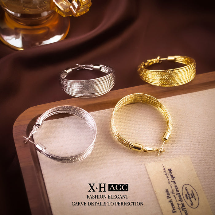 Wholesale Geometric multi-layer circle ear buckle, simple and fashionable, versatile earrings, niche design, high-end earrings