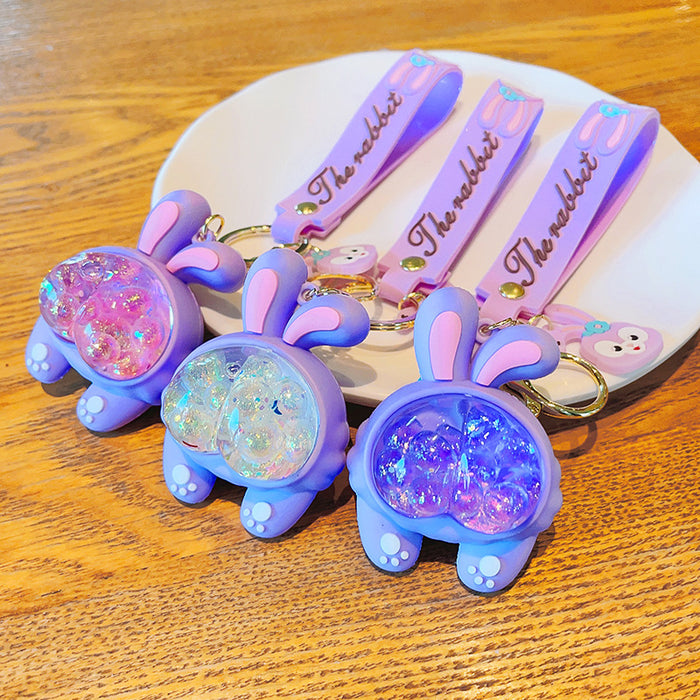 Wholesale creative oil key chain exquisite quicksand key chain women's bag pendant JDC-KC-ShuoT001