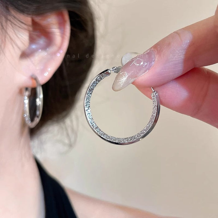 Wholesale Plain ring earrings are niche, light luxury, fashionable, with a high-end temperament and versatile circle earrings