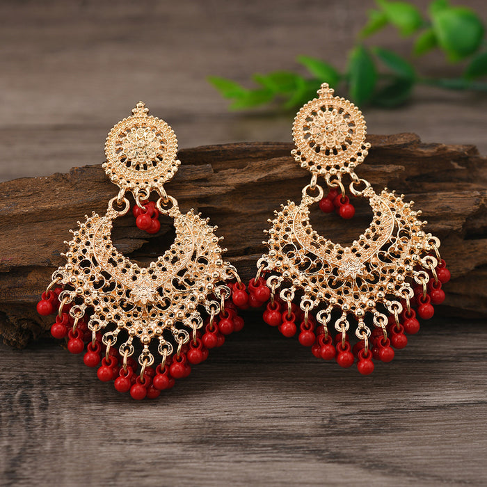 Wholesale Retro Bohemian ethnic style earrings for women exaggerated temperament hollow heart earrings long bell India