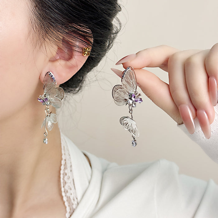 Wholesale Light luxury hollowed out lace butterfly earrings with silver needles, dynamic zircon earrings, earrings, pendants, and earrings