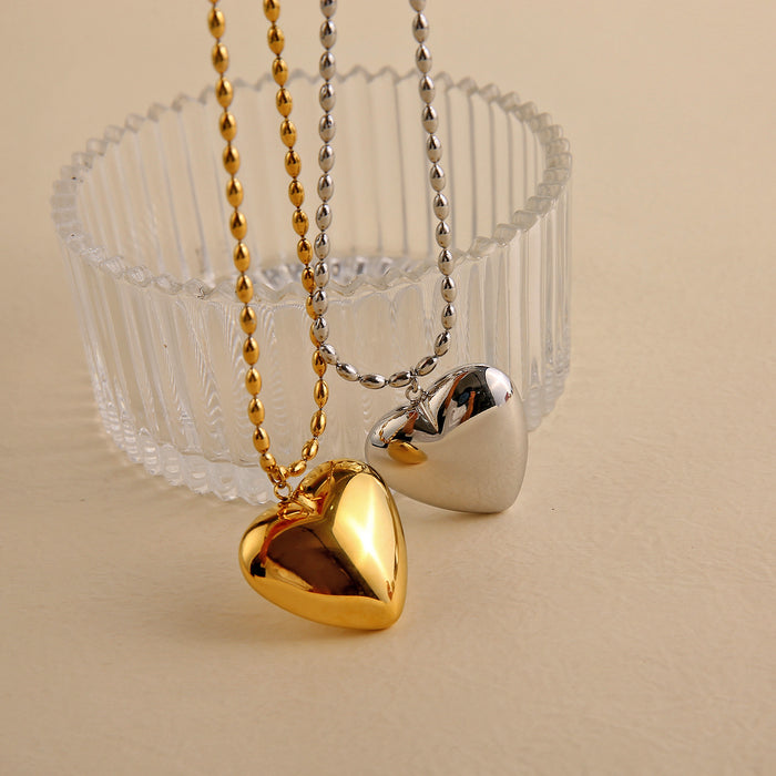 Wholesale Peach heart stainless steel heart-shaped necklace with exaggerated temperament, wholesale of heart-shaped accessories