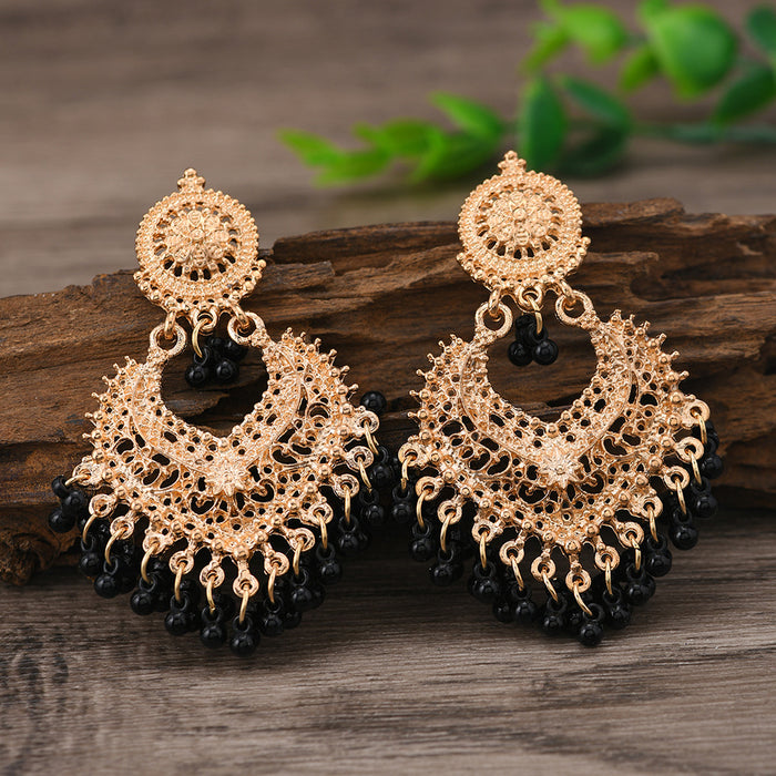 Wholesale Retro Bohemian ethnic style earrings for women exaggerated temperament hollow heart earrings long bell India