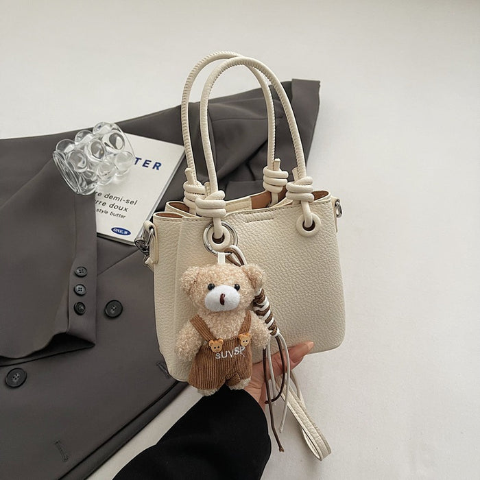 Wholesale Niche design, cute handheld commuting shoulder bag, fashionable and simple crossbody bag