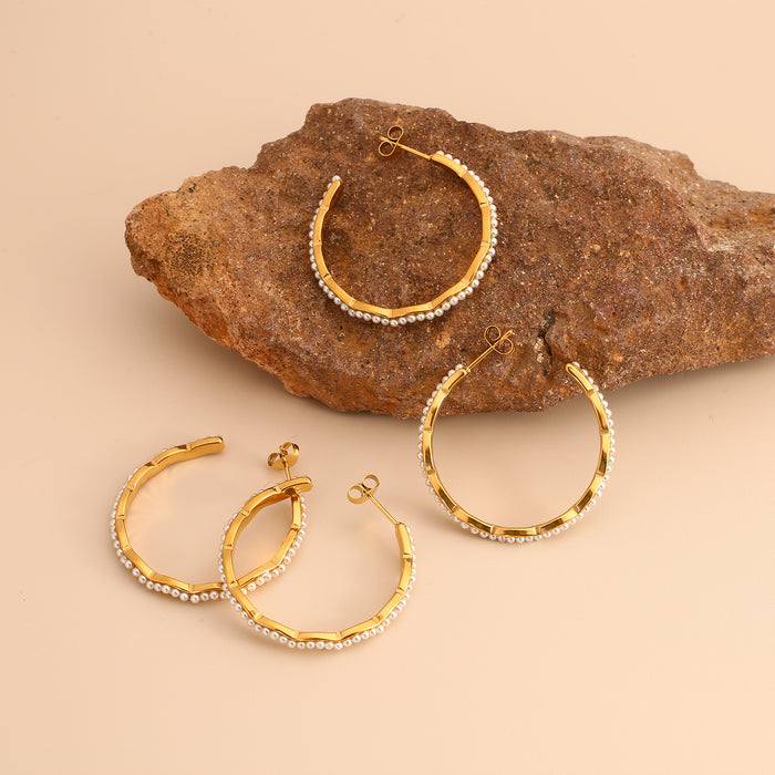 Wholesale Original design: Stainless steel earrings inlaid with pearls, personalized, luxurious, and high-end. Earrings with color preservation and electroplating wholesale