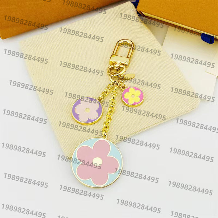 Wholesale Sunflower Letter Alloy Bag Pendant Keychain JDC-KC-LaoHuapi003