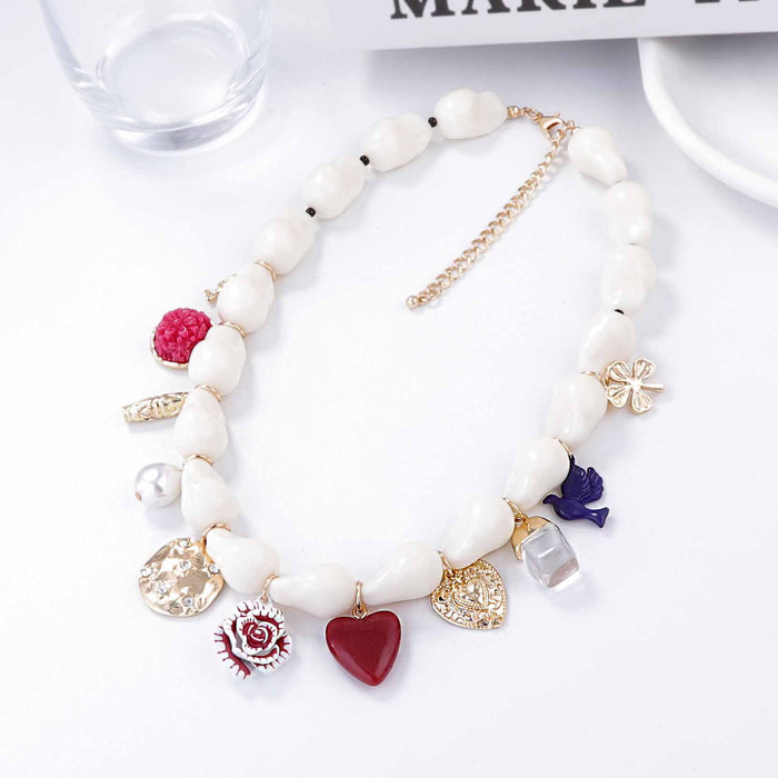Wholesale Imitation Pearl Oil Dropping Alloy Love Insect Flower Pendant Women's Clavicle Chain